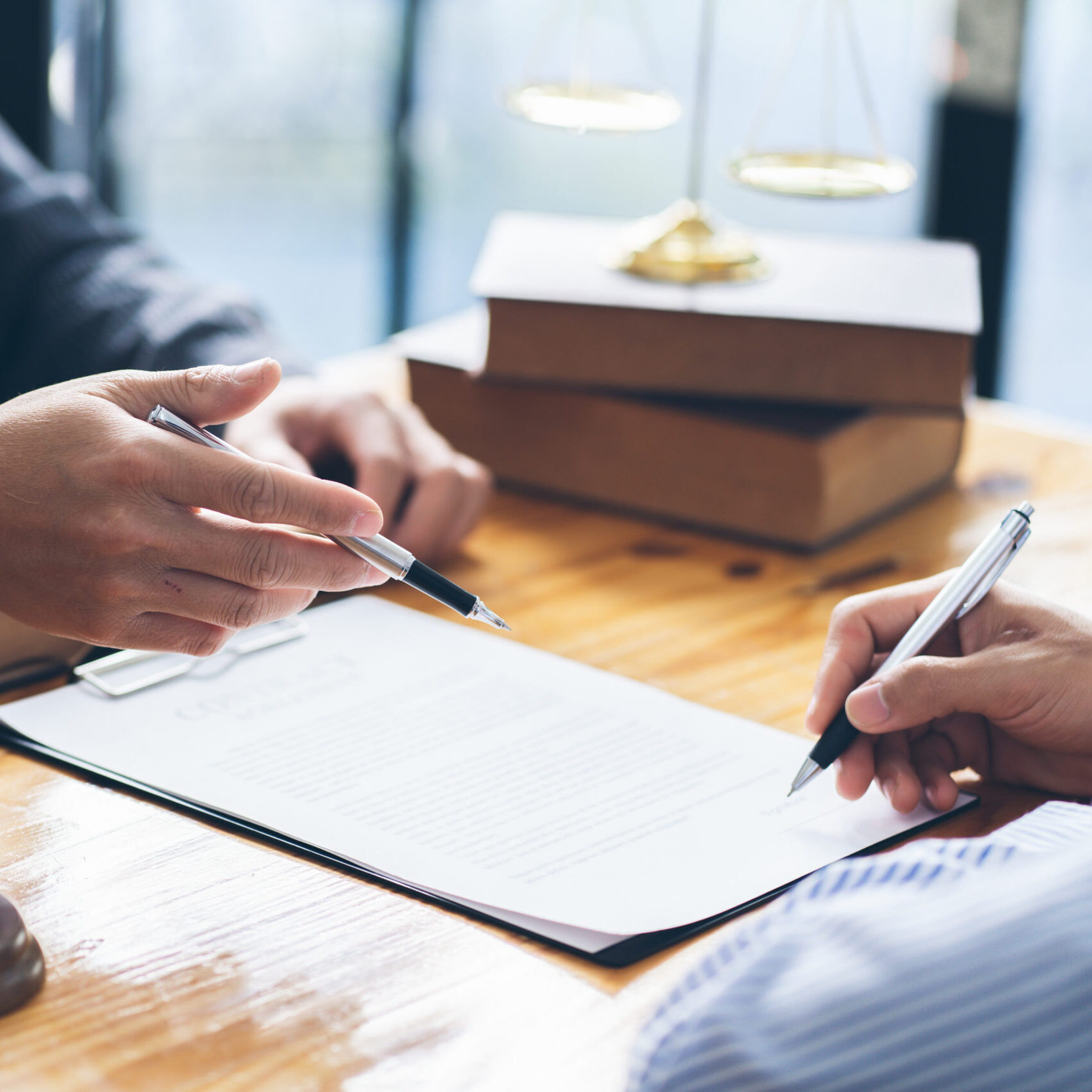male lawyer or judge consult having team meeting with client, la